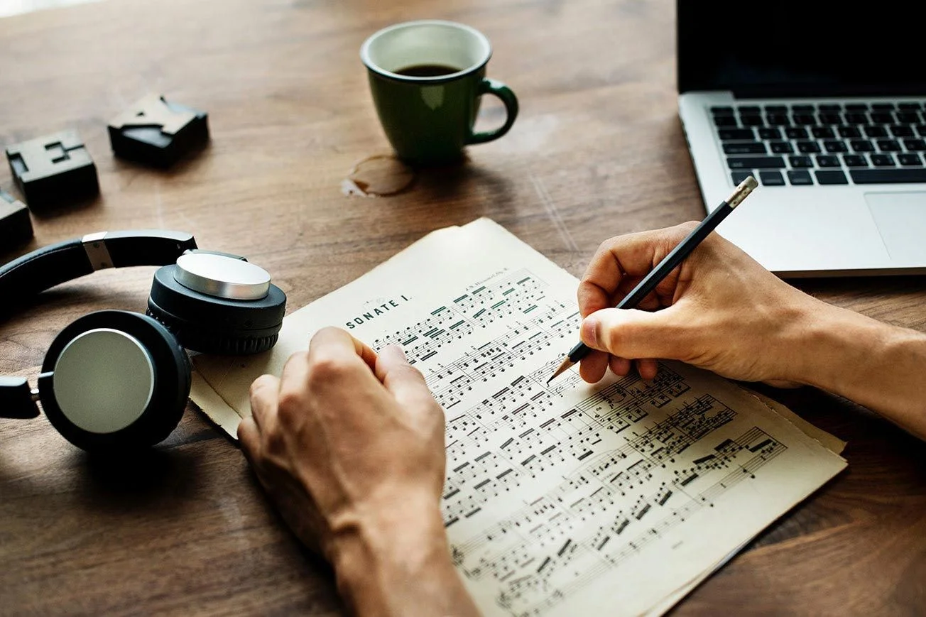 Laptop-and-Sheet-Music-f9a77e34