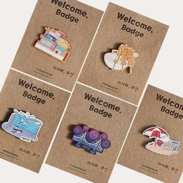 "meta_description": "Capture Busan's essence with the Wood Badge Souvenir Set. A must-have for collectors!",