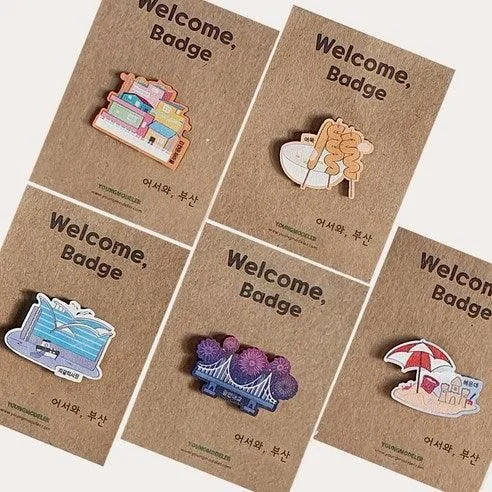 "meta_description": "Capture Busan's essence with the Wood Badge Souvenir Set. A must-have for collectors!",